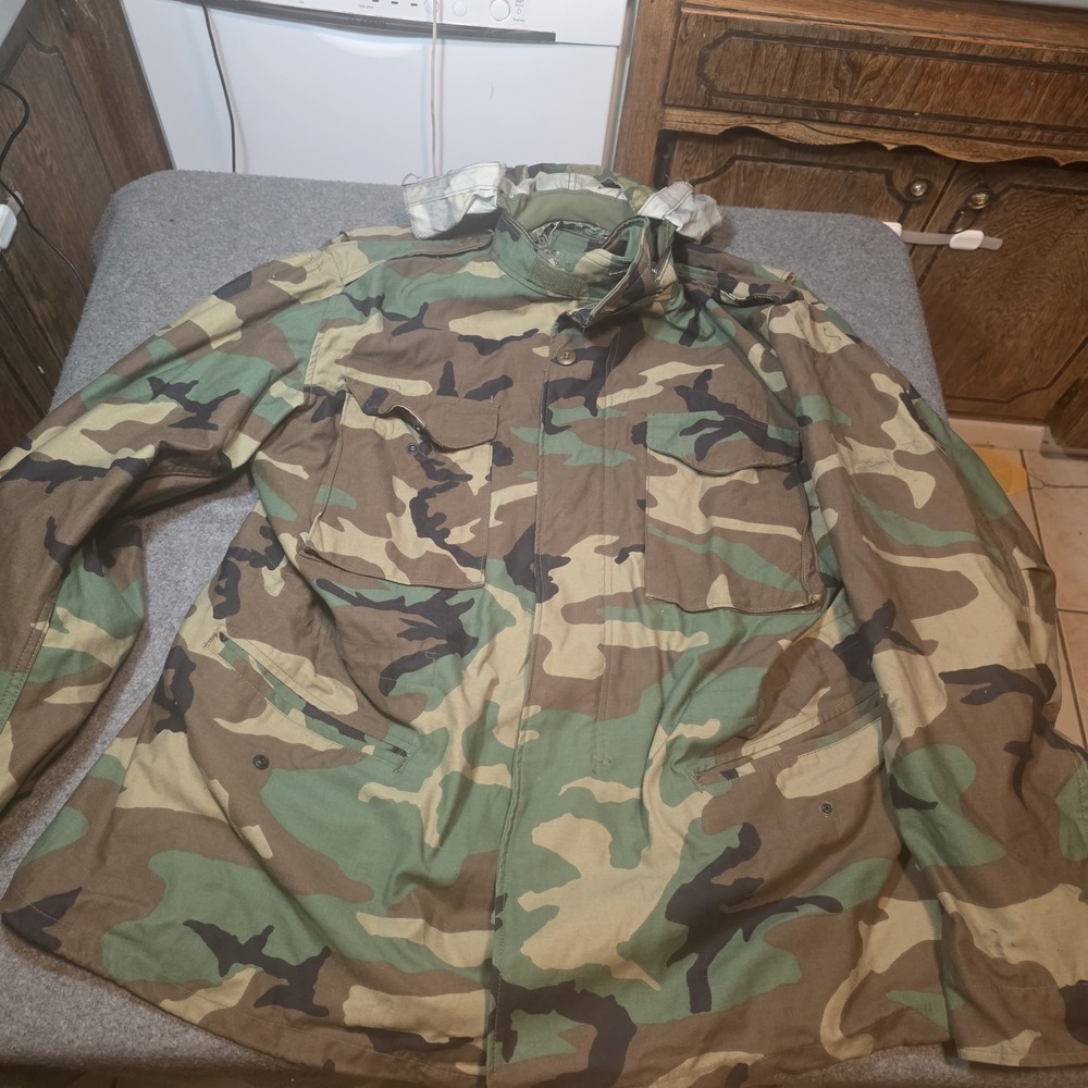vintage U.S. Military M-65 Cold Weather Field Jacket in a Woodland Camouflage L2